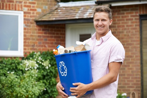 Types of waste collection bins for recycling and trash
